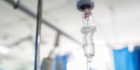 Intravenous infusion of normal saline in the hospital ward