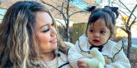 Sarahi Neberas holding her daughter Isabella Quintana in Aurora, Colo.