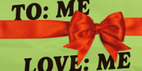 Illustration of a red ribbon wrapped over paper that reads "To: Me, Love: Me"