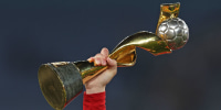 A player with Spain holds up the FIFA Women's World Cup Trophy on Aug. 20, 2023 in Sydney.