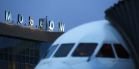 A logo sits illuminated above the passenger terminal at Domodedovo Airport ZAO in Domodedovo, Russia, on Friday, April 21, 2017. 