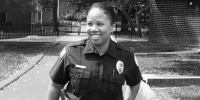 A black and white photo of Detective Sgt. Monica Mosley. in uniform.