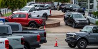 New Ford vehicles for sale at a dealership in Colma, Calif. on June 21, 2024. 