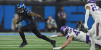 Detroit Lions running back Jahmyr Gibbs #26 runs against the Minnesota Vikings during the first half of an NFL football game on Jan. 5, 2025.