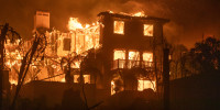 The Palisades Fire burns homes