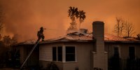 Fire crews battle the Eaton Fire