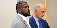 New England Patriots safety Jabrill Peppers stands at his arraignment