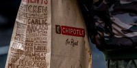 A to-go bag from Chipotle.