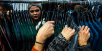 People shop on Thanksgiving Day in New York on Nov. 28, 2013.