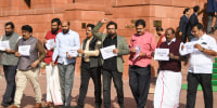 MPs of the opposition parties hold a protest outside the parliament new delhi