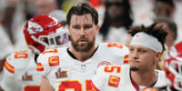 Kansas City Chiefs tight end Travis Kelce and quarterback Patrick Mahomes walk off the field at halftime during the Super Bowl  