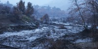 Residents of southern Californians are evacuating their homes because of the heavy rain and debris flows that threaten mudslides in areas recovering from wildfires. 