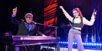 Elton John and Chappell Roan perform at an Academy Awards viewing party on March 2, 2025 in West Hollywood, Calif.