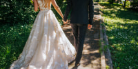 Bride and groom walking on pavements