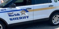 A Norfolk Sheriff's Office police car outside