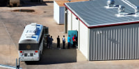 Detainees are escorted off of a bus at the Bluebonnet Detention Facility, in Anson texas ICE immigration and customs enforcement aerial drone