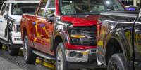 Vehicles at Ford assembly plant.