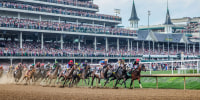 Jockeys compete in the 150th running of the Kentucky Derby at Churchill Downs 