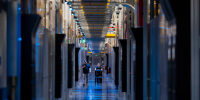 People walk through the hallways at Equinix Data Center 