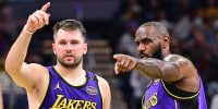Luka Doncic and LeBron James during a Los Angeles Lakers v Indiana Pacers basketball game.