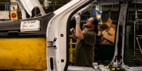 A worker on the trim assembly line at the General Motors assembly plant