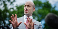 Stephen Miller speaks with reporters.