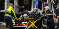 New York Yankees' Oswaldo Cabrera is taken from the field on a stretcher after injuring his leg.