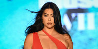 Lauren Chan walks the runway at the Sports Illustrated Swimsuit show on June 1, 2024. 
