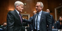 Image: Secretary of Health and Human Services Robert F. Kennedy Jr., speaks with committee chairman Senator Bill Cassidy, R-La.,
