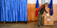 A person casts his vote.
