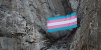 A group of trans, queer and ally climbers unfurled a massive transgender Pride flag on the face of Yosemite National Park's iconic El Capitan rock﻿ formation. 
