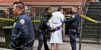 New York police officers arrest John Woeltz on May 23, 2025, in New York. 