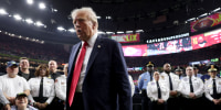 President Donald Trump reacts after posing with family members of victims in the January 1 attack on Bourbon Street and emergency responders prior to Super Bowl LIX between the Kansas City Chiefs and the Philadelphia Eagles at Caesars Superdome on February 09, 2025. 