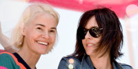 Leisha Hailey and Kate Moennig smiling.