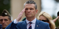 Defense Secretary Pete Hegseth salutes during a ceremony at the Normandy American Cemetery to mark the 81st anniversary of the D-Day landings on June 6, 2025 in Colleville-sur-Mer, France. 