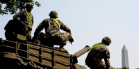 U.S. Army soldiers work on an assortment of military vehicles in West Potomac Park on June 11, 2025, ahead of the military parade in honor of the U.S. Army's 250th anniversary.