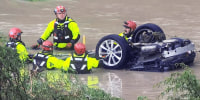 Responders in floodwater early Thursday morning June 12 in San Antonio.