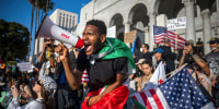 Immigration Protests Los Angeles crowd megaphone