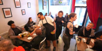 Diners at a restaurant in Philadelphia on May 22, 2025. 