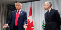 Donald Trump, left, and Mark Carney speak