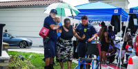 EMS personal assist a women after the Paterson Public Schools graduation at Hinchliffe Stadium, Jun 23, 2025, in Paterson, N.J.