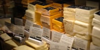 Grocery store cheese selection.