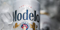 A can of Modelo in ice