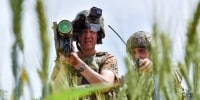 Ukrainian servicemen search a target with a US Stinger air