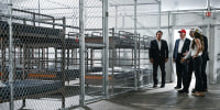 President Donald Trump, Florida Governor Ron DeSantis and Secretary of Homeland Security Kristi Noem tour a migrant detention center, dubbed "Alligator Alcatraz,