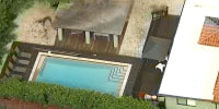 An aerial view of the home and pool where the four-year-old drowned in El Portal, Fla.