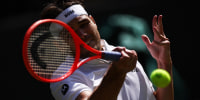 A malfunction with Wimbledon 's new electronic line-calling system required a point to be replayed during a quarterfinal match between Taylor Fritz and Karen Khachanov on Tuesday.