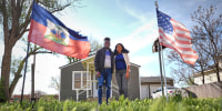 Kevenson Jean and Sherlie Jean pose next to one another