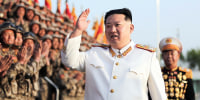 North Korean leader Kim Jong Un acknowledges the officers and soldiers who took part in a celebration the 90th founding anniversary of the Korean People's Revolutionary Army, in North Korea Wednesday, April 27, 2022.