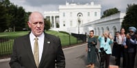  Tom Homan talks with reporters 